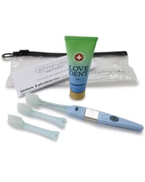 Ionen Zahnbürste mit LOVE DENT Zahnpasta, 30ml inkl. 2 Ersatzbürsten, Anleitung und Flugbeutel.
